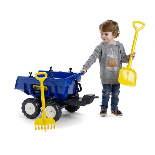 Little boy playing with New Holland Maxi 940NH tipper trailer