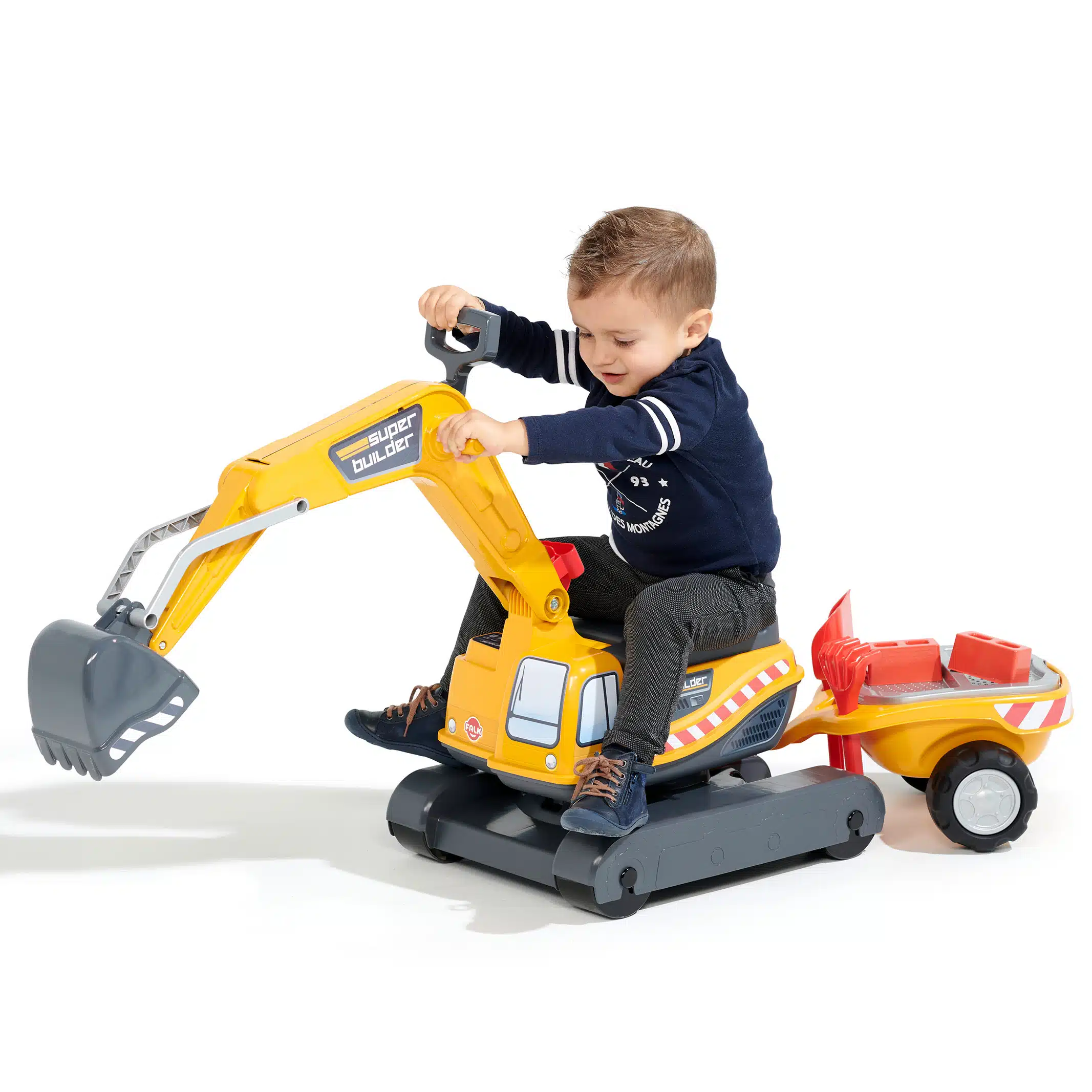 Garçon jouant avec pelleteuse Super Builder