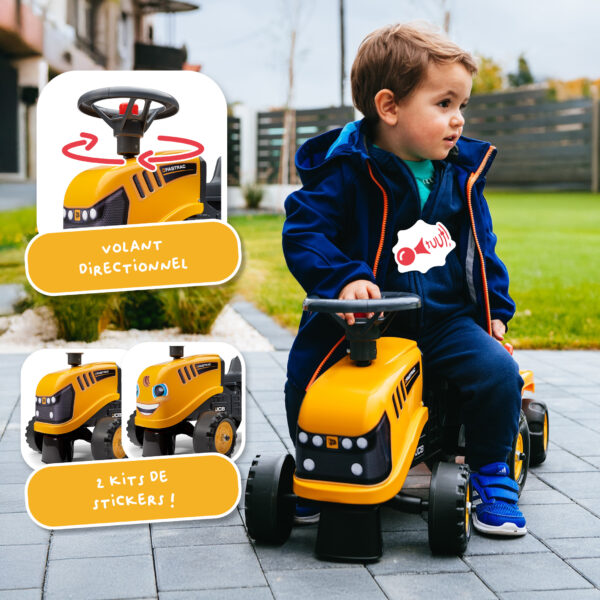 Enfant sur porteur JCB