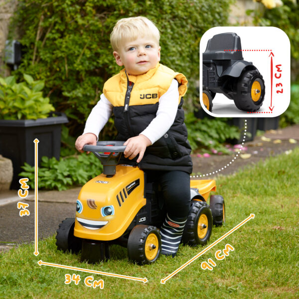Enfant sur porteur JCB