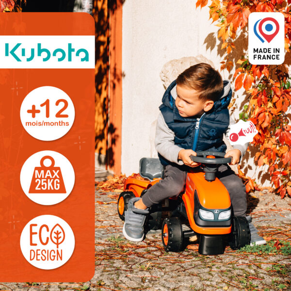Enfant sur porteur tracteur Kubota