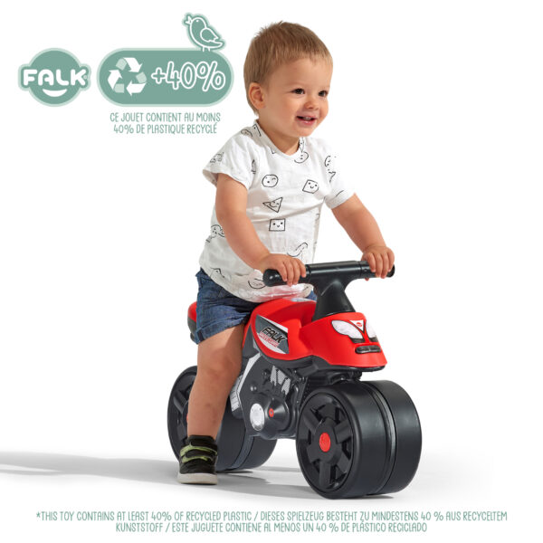 Enfant sur moto draisienne Falk
