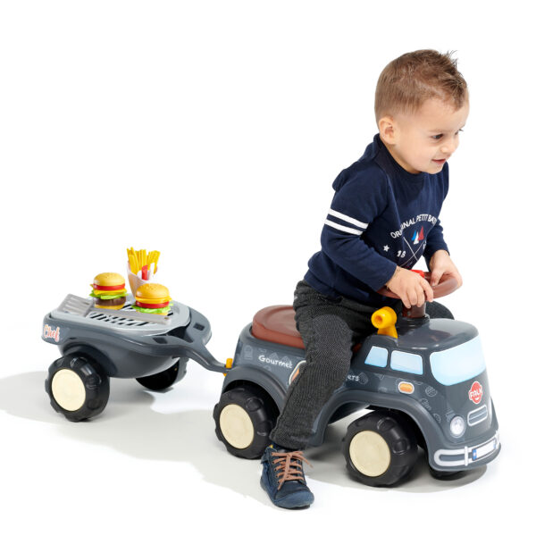 Enfant sur porteur Food Truck