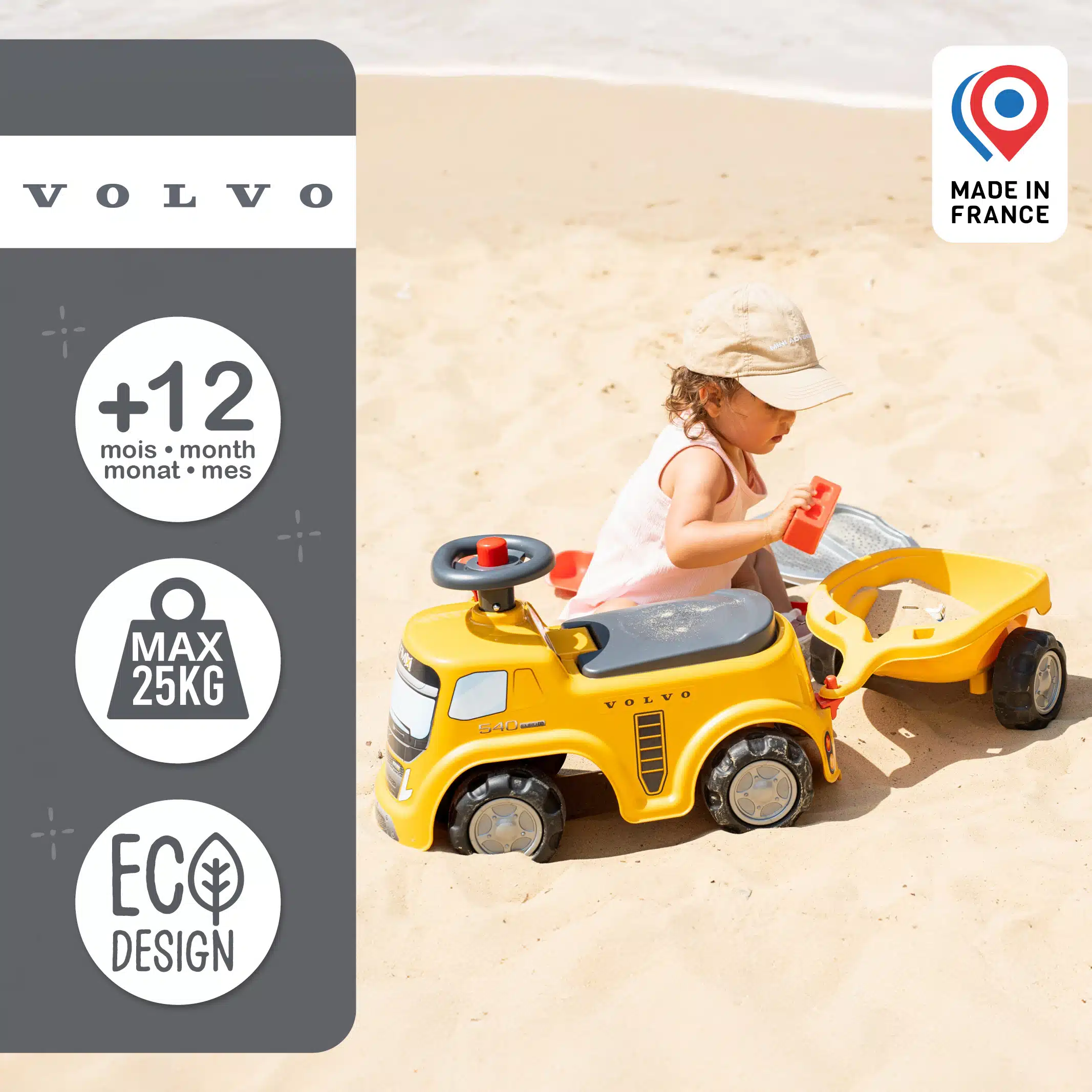Enfant sur porteur camion Volvo