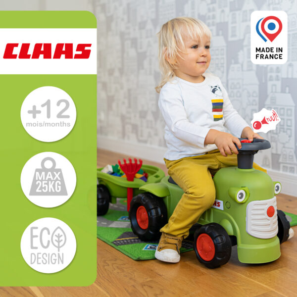 Enfant sur porteur tracteur Claas