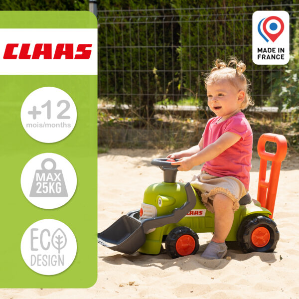 Enfant sur porteur tracteur Claas