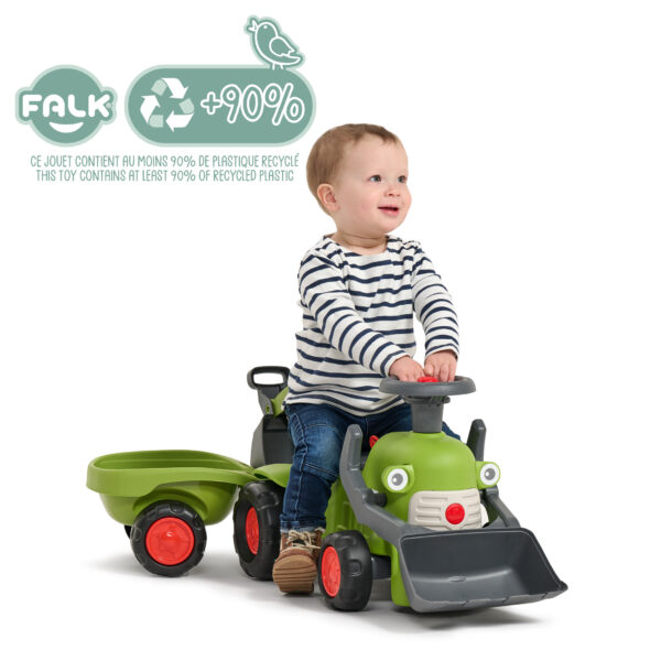 Enfant sur porteur tractopelle Claas