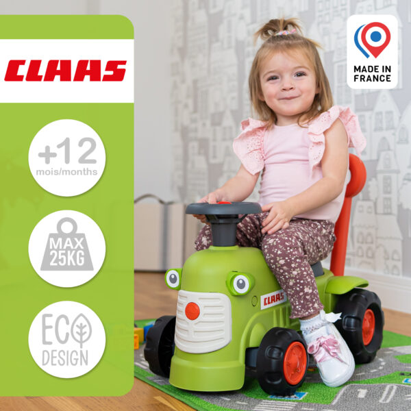 Enfant sur porteur tracteur Claas