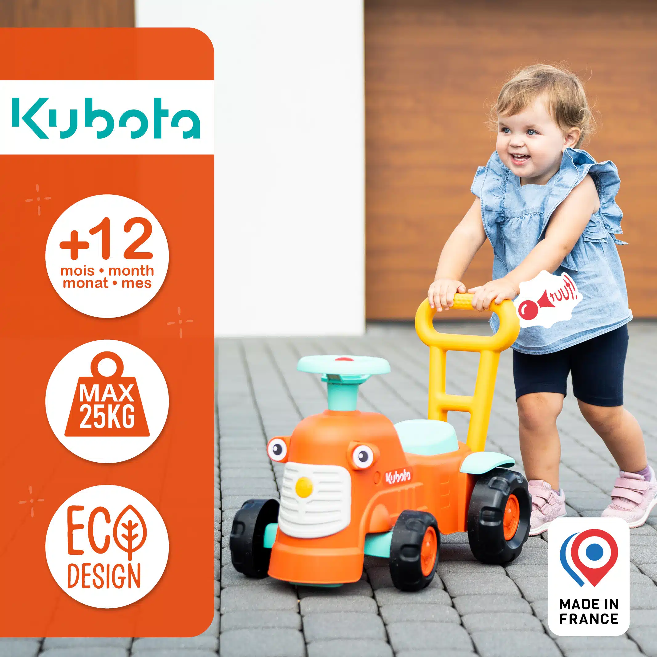 Enfant sur porteur tracteur Kubota