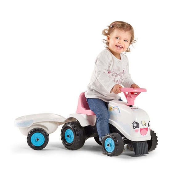 Kid playing with Ride-on Tractor Rainbow Farm