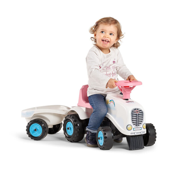 Kid playing with Ride-on Tractor Rainbow Farm