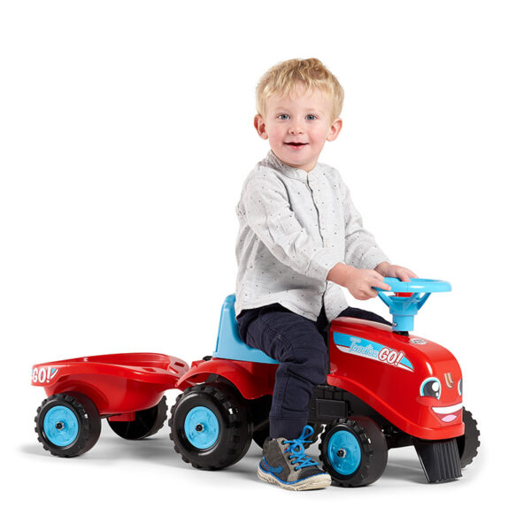 Pandit Boy playing with Ride-on Tractor Go!