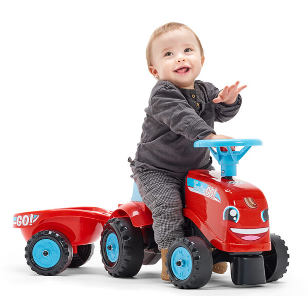 Pandit Boy playing with Ride-on Tractor Go!