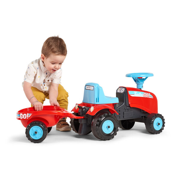 Pandit Boy playing with Ride-on Tractor Go!