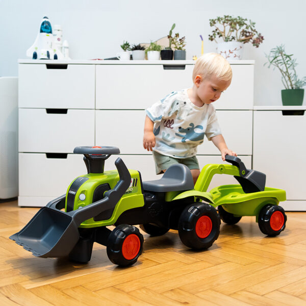 Boy on Ride-on Tractor Claas