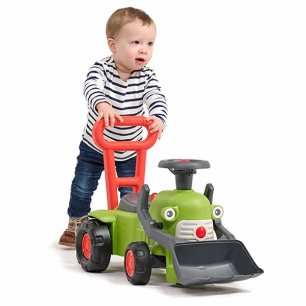 Boy on Ride-on Tractor CLAAS with front shovel