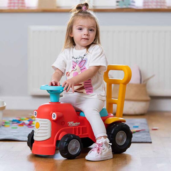 Girl on Ride-on Tractor Maurice red