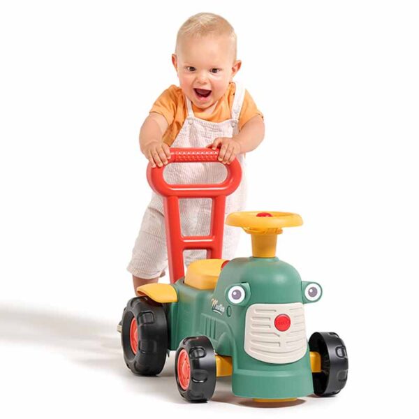 Boy with Ride-on Tractor Maurice green