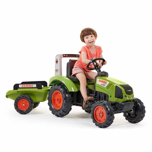 Girl on Pedal tractor Claas 1040AB