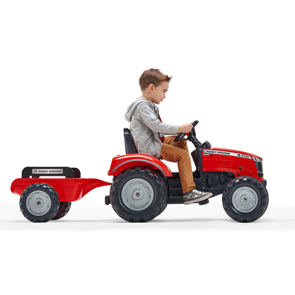 Kid playing with Pedal tractor Massey Ferguson red 4010AB