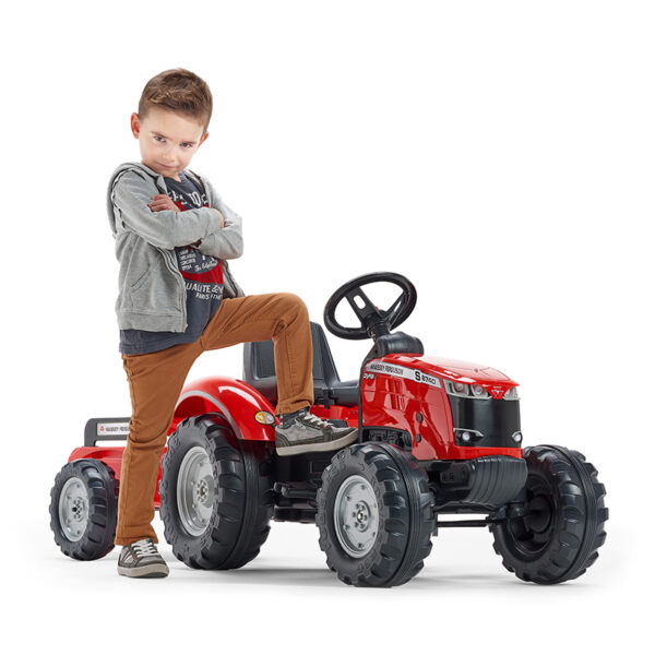 Kid playing with Pedal tractor Massey Ferguson red 4010AB