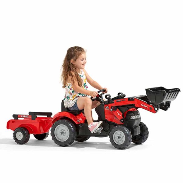 Enfant jouant avec Tractopelle Case IH 961AM