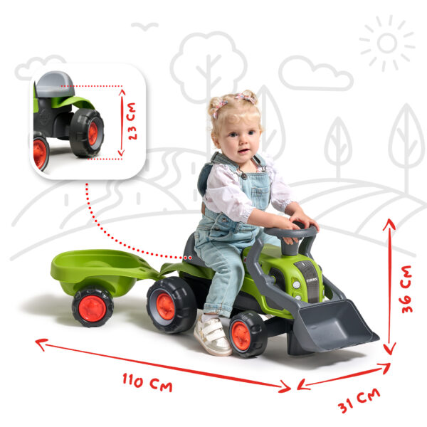 Enfant sur Porteur tracteur Claas