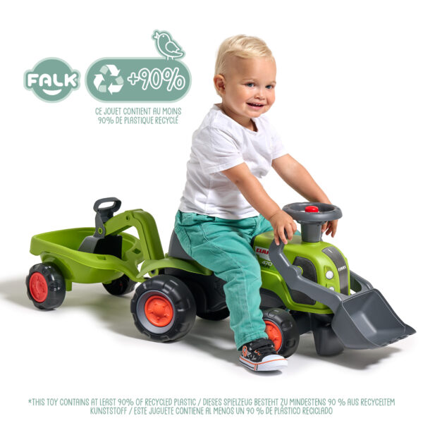 Enfant sur Porteur tracteur Claas