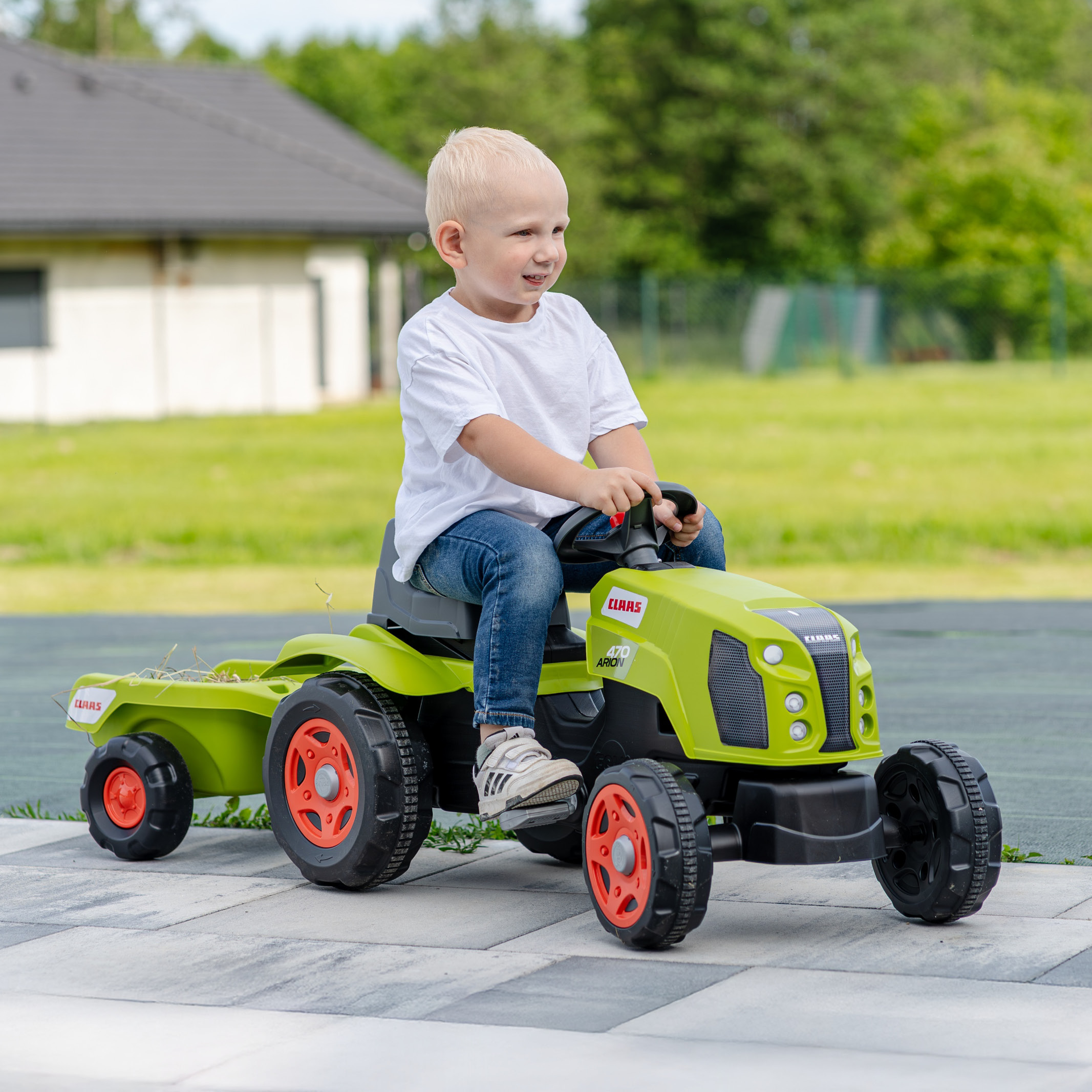 Enfant sur tracteur Claas