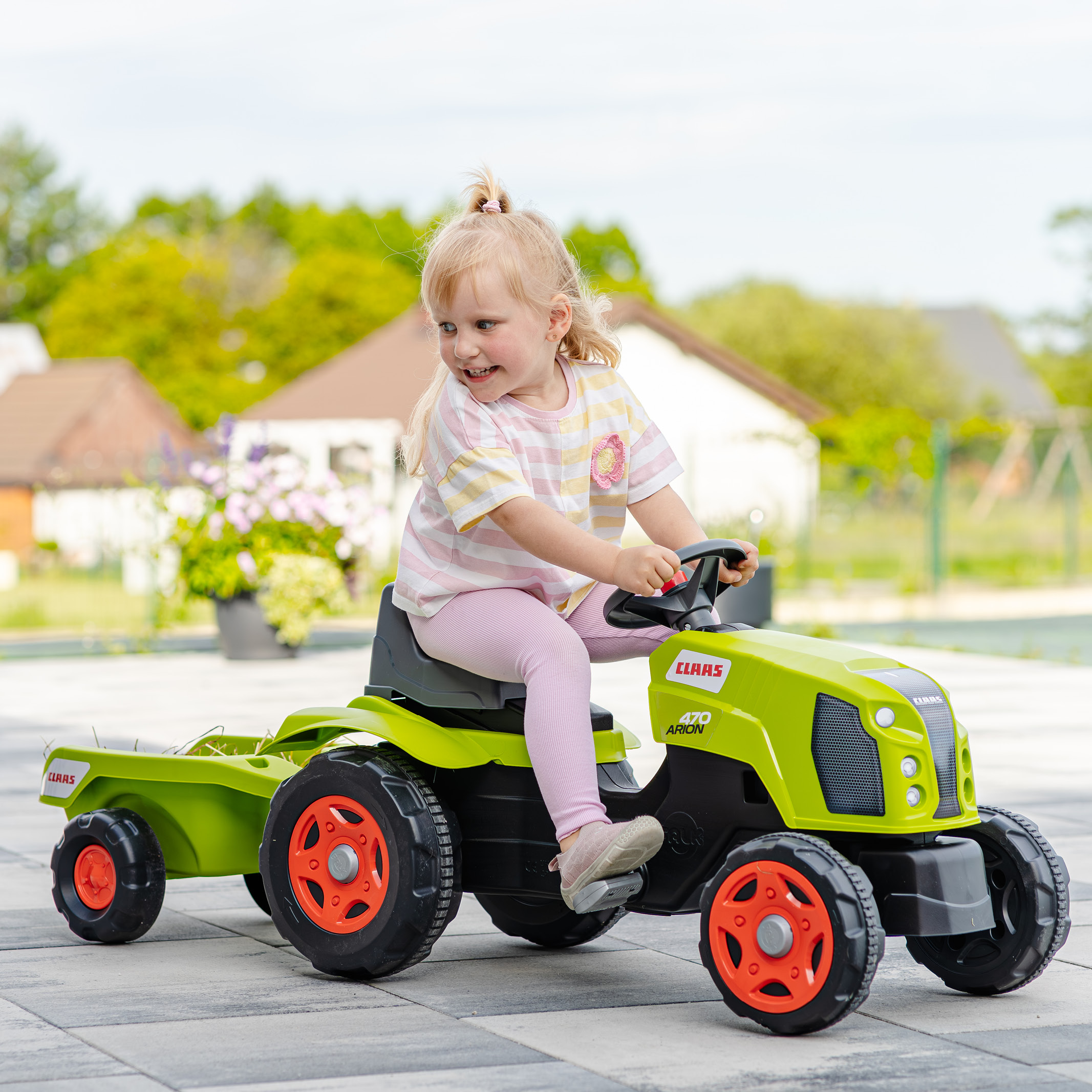 Enfant sur tracteur Claas