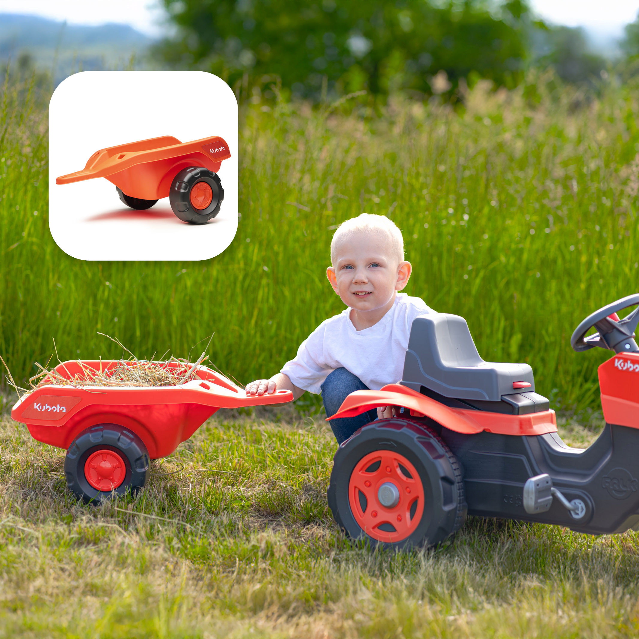 Enfant sur Tracteur Kubota
